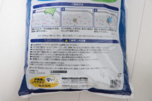 情熱価格 固まるネコ砂（パッケージ裏の商品説明下部）